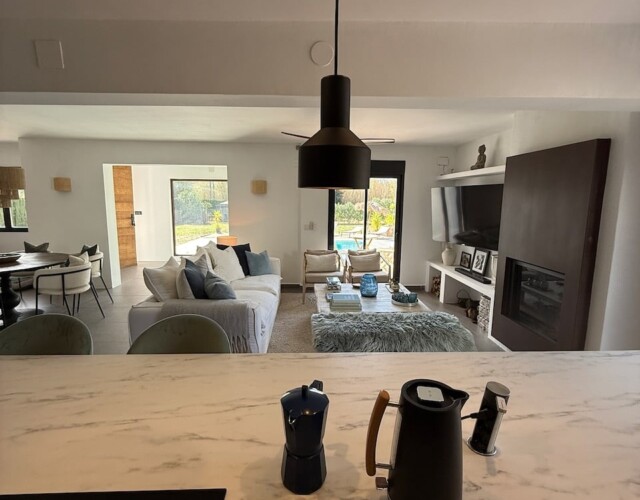 Looking from kitchen onto living area