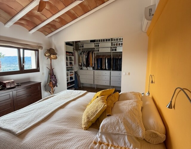 Master bedroom and closet with valley views