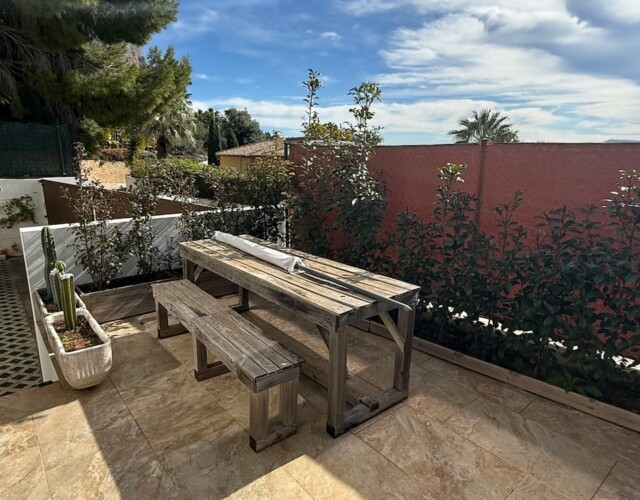 Outdoor patio in front of house