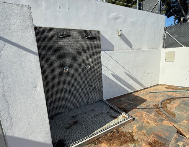 Outdoor showers in pool area