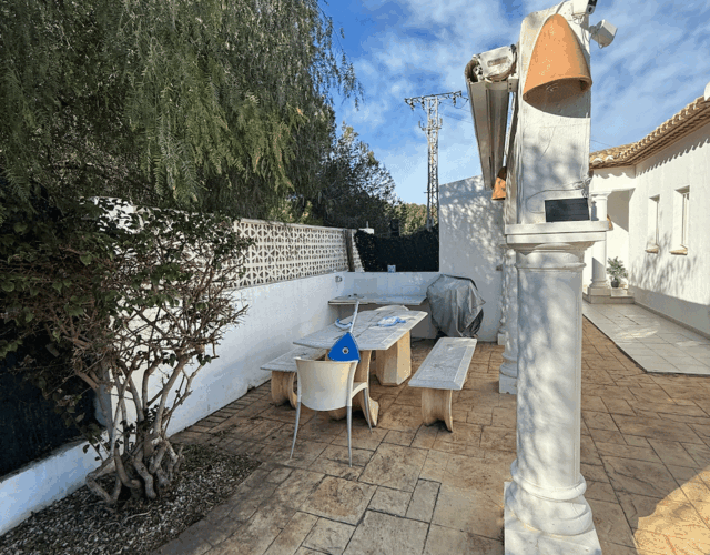 Outside sitting area on side of house