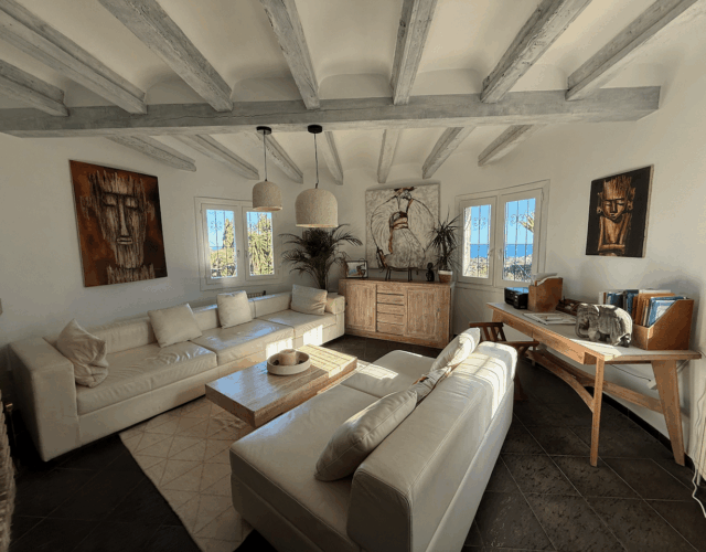 Living room on main level next to dining room