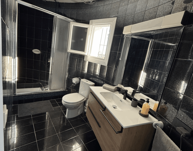 Upper level bathroom with that separate bedroom