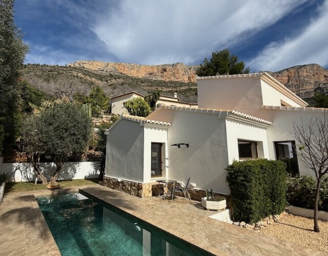 Pool area on side of house
